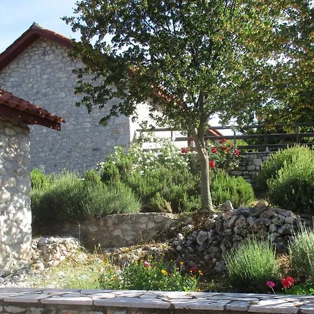 Amygdalia, A Stone House In A Quiet Landscape