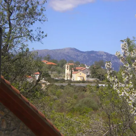 Amygdalia, A Stone House In A Quiet Landscape