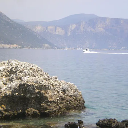 Amygdalia, A Stone House In A Quiet Landscape