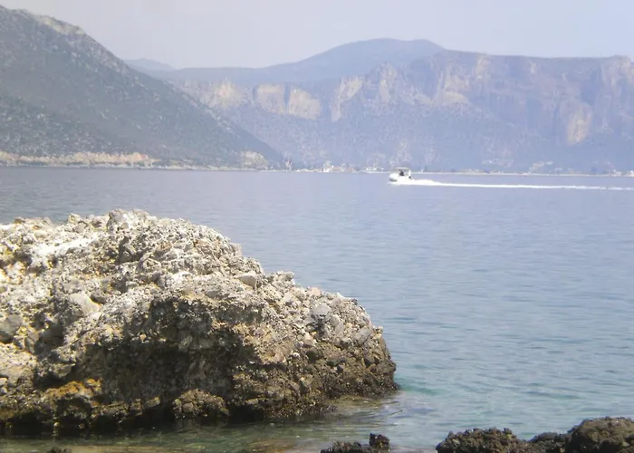 Amygdalia, A Stone House In A Quiet Landscape