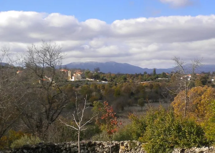 Amygdalia, A Stone House In A Quiet Landscape