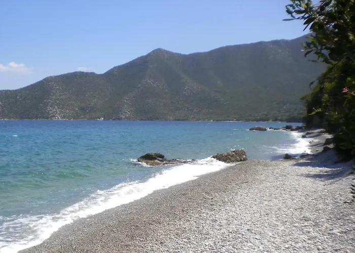 Amygdalia, A Stone House In A Quiet Landscape